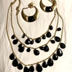 Black beaded gold tone 3 strand necklace and earring set